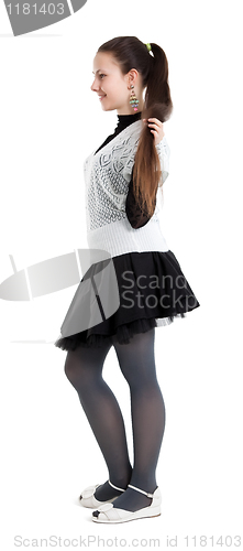 Image of Beautiful girl with long hair in the profile.