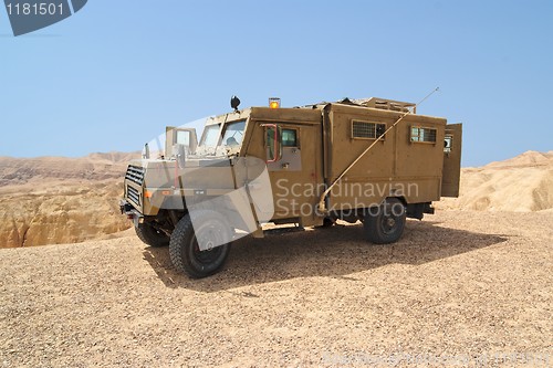 Image of Israeli army Humvee on patrol in the Judean desert 