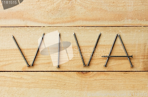 Image of VIVA word is composed with nails 