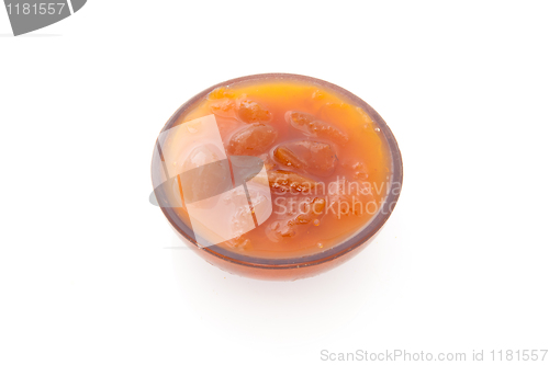 Image of Orange confiture in a jar. isolated on a white