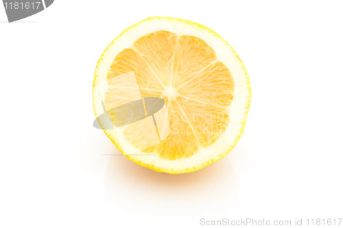 Image of Single cross section of lemon. Isolated. Close-up.
