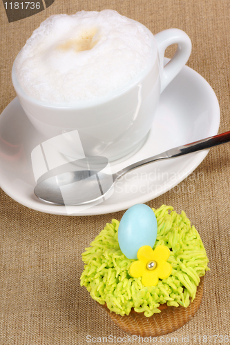 Image of Cappuccino and Easter cupcake