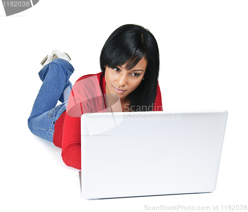 Image of Young woman with laptop computer