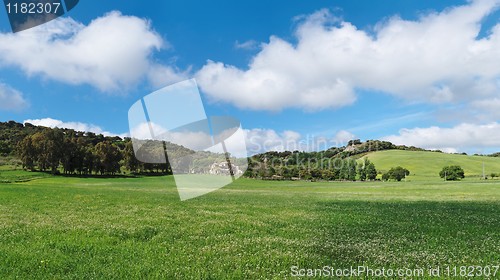 Image of Spanish mansion among the green meadows