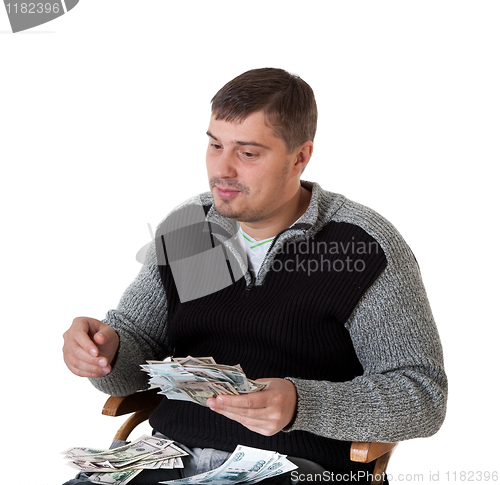 Image of A young man finds money