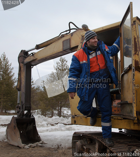 Image of Machinist excavator in a good mood