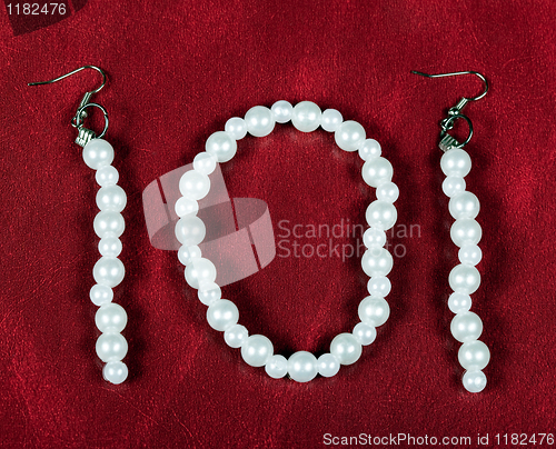 Image of Bracelet and earrings of pearls. Bijouterie