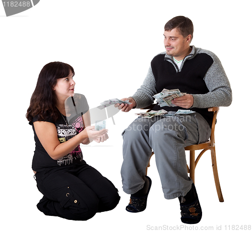 Image of Young couple holding money on white background