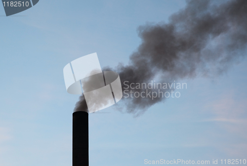 Image of pipe coal-fired boiler emits black smoke