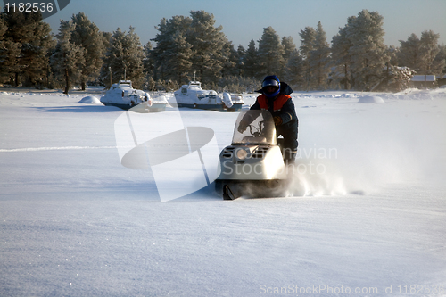 Image of Snowmobile at full speed