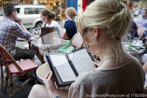 Image of Lady at Parisian cafe