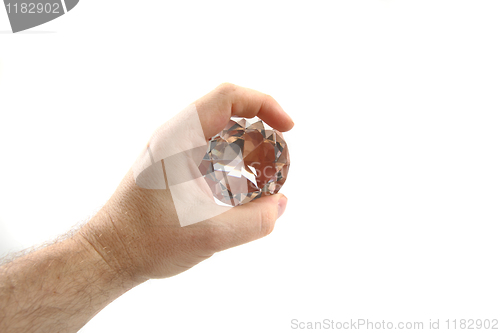 Image of diamond in the hand 