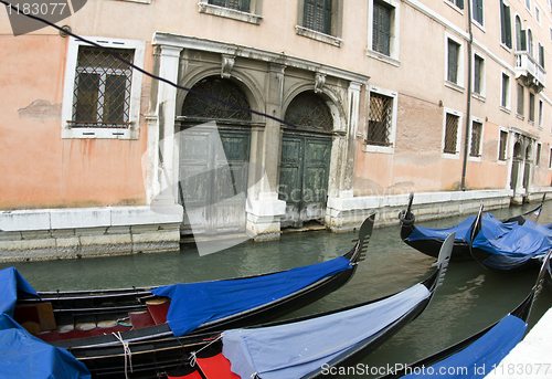 Image of gondolas in canal Venice Italy