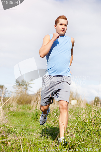 Image of Mixed race man running