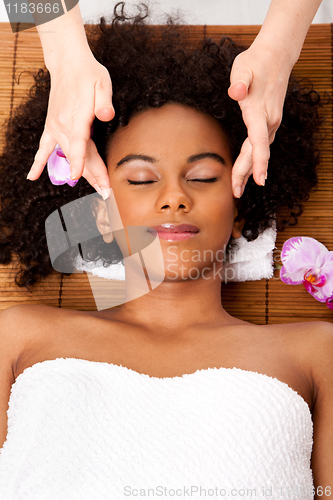 Image of Facial temple massage in beauty spa