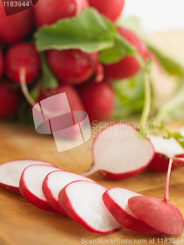Image of fresh radishes on white background