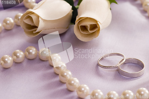 Image of roses and wedding rings