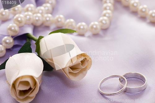 Image of roses and wedding rings