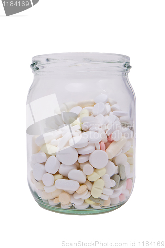 Image of pills in glass container