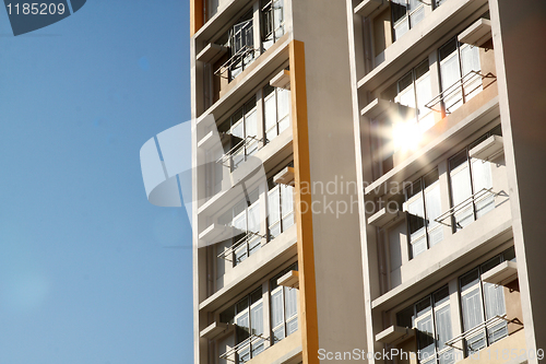 Image of new apartments building and blue sky as a background 