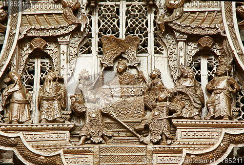 Image of Chinese old story stone carving with group people. 