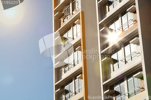 Image of new apartments building and blue sky as a background 