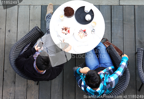 Image of Aerial view of two man talking