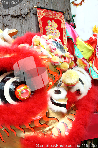 Image of Close up of a red chinese lion head 