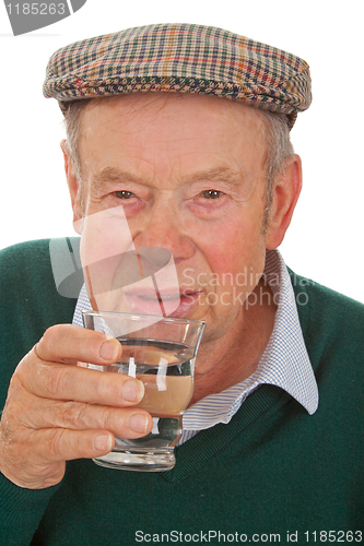 Image of Male senior drinking water 