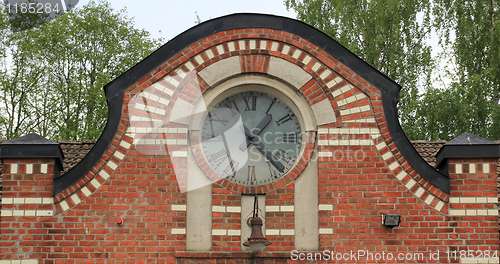 Image of Clock on an old building.