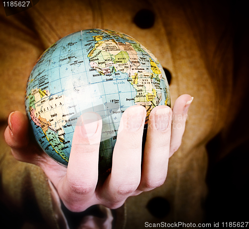 Image of Globe in a girl's hands