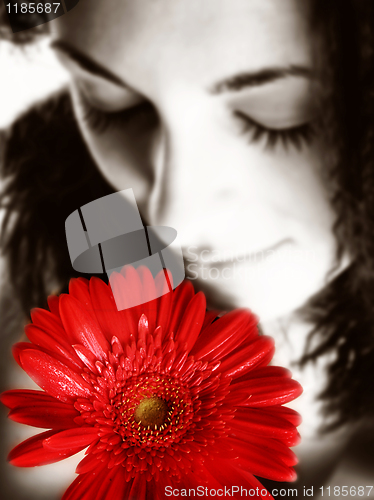 Image of Girl with a red flower
