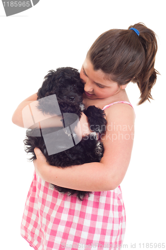 Image of Girl playing with dog
