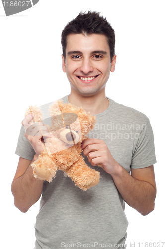 Image of Man holding teddy bear