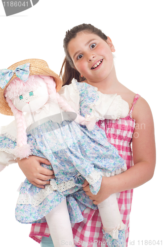 Image of Little girl with doll