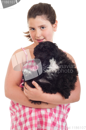Image of Girl holding dog
