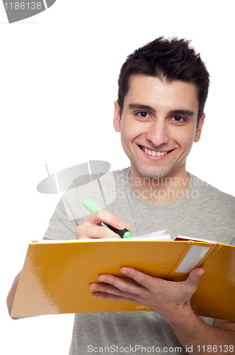 Image of Man studying with dossier