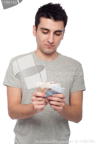 Image of Man holding money
