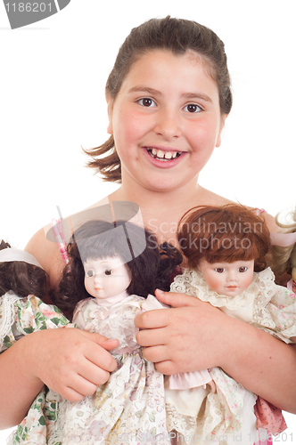 Image of Little girl with dolls