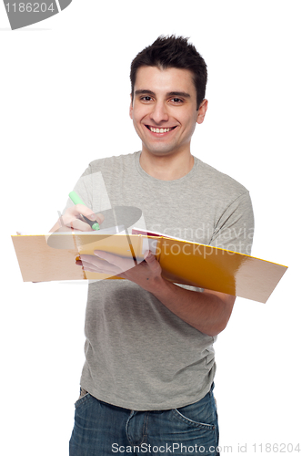 Image of Man studying with dossier