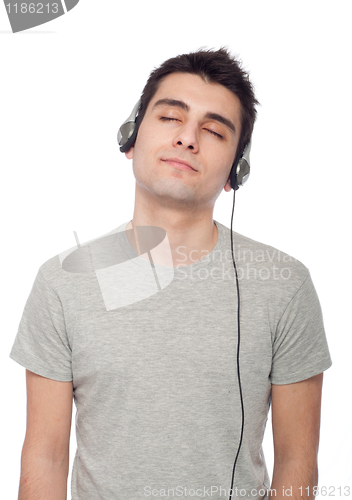 Image of Casual man listening music