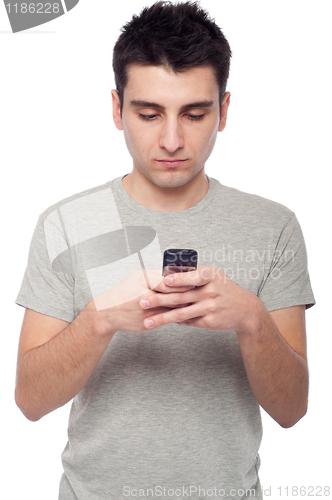 Image of Casual man text messaging