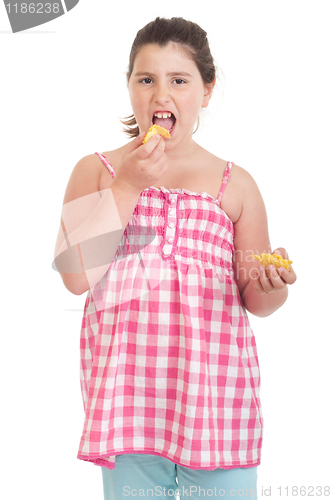 Image of Girl eating chips