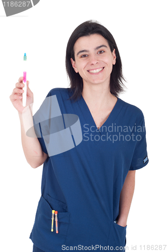 Image of Dentist holding toothbrush