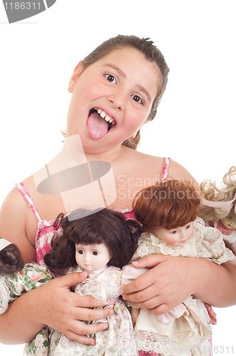 Image of Little girl with dolls