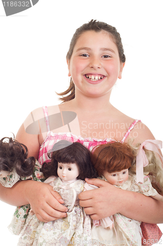 Image of Little girl with dolls