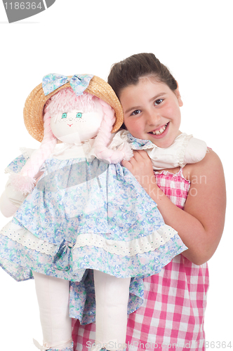Image of Little girl with doll