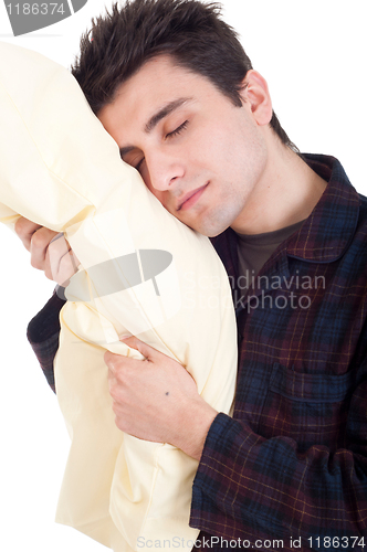 Image of Man in pajamas holding pillow