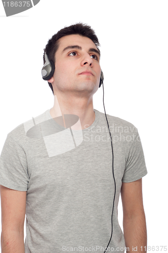 Image of Casual man listening music