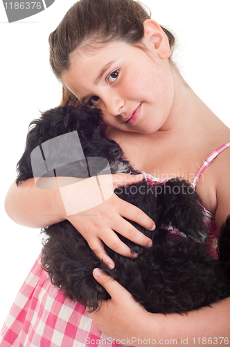 Image of Girl holding dog